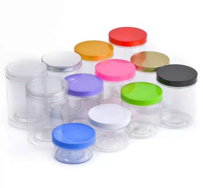 Bottile di plastica di qualità alimentare con maniglia e coperchio per la conservazione sicura degli alimenti