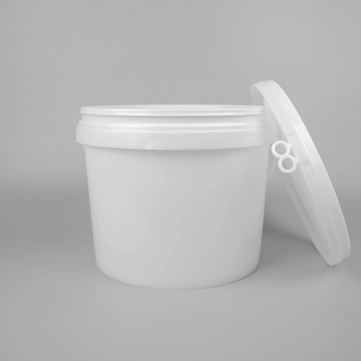 Barattolo di vernice di plastica rossa con coperchio
