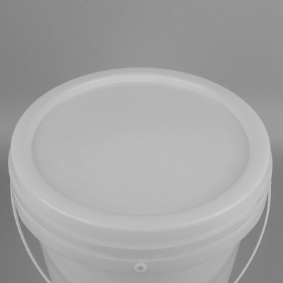 Barattolo di vernice di plastica rossa con coperchio