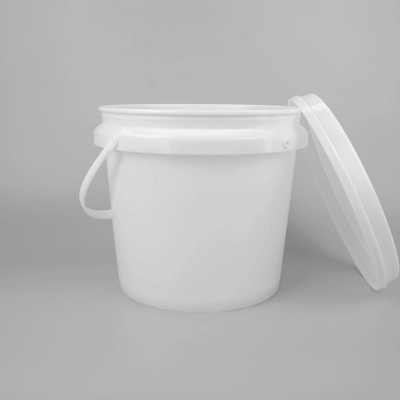 Barattolo di vernice di plastica rossa con coperchio